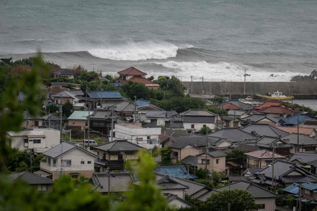 Waves hit the coastline as severe tropical storm Jangmi approaches in Tateyama, Chiba prefecture on June 3, 2026. (Photo by Yuichi YAMAZAKI / AFP)