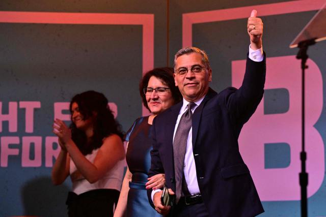 Democrat California Gubernatorial candidate Xavier Becerra gives a thumbs up to the crowd of supporters after speaking at an election night event in downtown Los Angeles, on June 2, 2026. Californians go to the polls Tuesday in the first round of voting for a new governor, with a tight three-way race for two run-off spots, while people in Los Angeles will also be voting for a new mayor. The state's so-called "jungle primary" pits all comers against each other -- regardless of party -- with the top two vote-getters advancing to the November general election to replace term-limited Governor Gavin Newsom. (Photo by Frederic J. Brown / AFP)