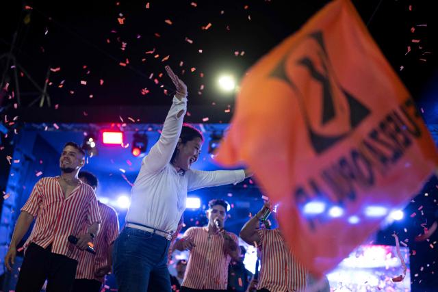 Peru's presidential candidate for the Fuerza Popular party, Keiko Fujimori, waves during a campaign rally in Huacho, north of Lima, Peru, on June 2, 2026. Peruvians will choose on June 7, 2026 their president from between the right-wing Keiko Fujimori, heir to a political dynasty that divides the nation, and the left-wing Roberto Sánchez: two diametrically opposed visions for a country plagued by instability and crime. (Photo by Ernesto BENAVIDES / AFP)