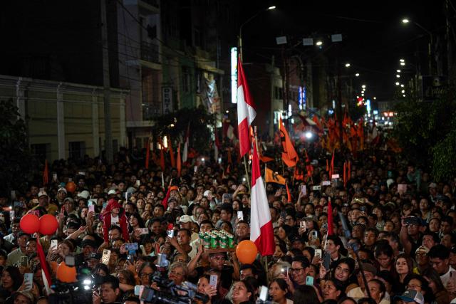 Supporters of Peru's presidential candidate for the Fuerza Popular party, Keiko Fujimori, are seen during a campaign rally in Huacho, north of Lima, Peru, on June 2, 2026. Peruvians will choose on June 7, 2026 their president from between the right-wing Keiko Fujimori, heir to a political dynasty that divides the nation, and the left-wing Roberto Sánchez: two diametrically opposed visions for a country plagued by instability and crime. (Photo by Ernesto BENAVIDES / AFP)