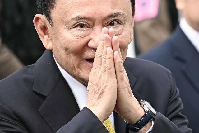 (FILES) Thailand's former prime minister Thaksin Shinawatra arrives at the Supreme Court in Bangkok on September 9, 2025, ahead of a ruling on whether he properly served a prison term in 2023. Thaksin Shinawatra has met the conditions for royal pardon as part of a clemency measure marking the queen's birthday, the justice minister said on June 3, 3026. Thaksin, 76, served eight months of a one-year sentence for corruption and abuse of power before he was released on parole last month due to his age. (Photo by Lillian SUWANRUMPHA / AFP)