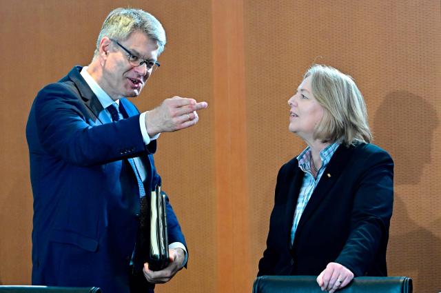 German Minister for Labour and Social Affairs Baerbel Bas (R) and German Transport Minister Patrick Schnieder talk prior to the weekly cabinet meeting at the Chancellery in Berlin on June 3, 2026. (Photo by Tobias SCHWARZ / AFP)