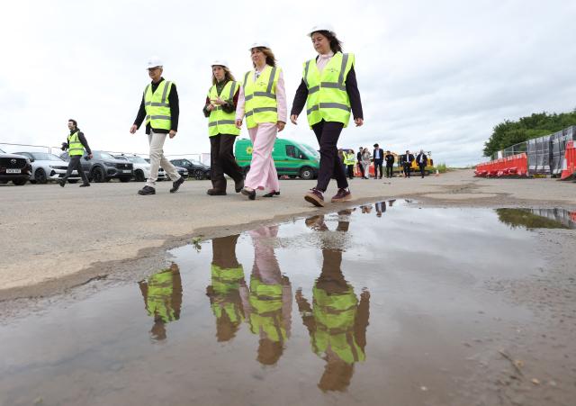 Britain's Chancellor of the Exchequer Rachel Reeves (2R) visits the site where the Universal United Kingdom theme park is planned to be built, near Bedford, north of London on June 3, 2026. (Photo by Chris Radburn / POOL / AFP)