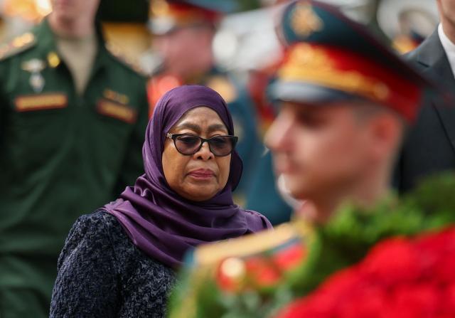 Tanzania's President Samia Suluhu Hassan attends a wreath-laying ceremony at the Tomb of the Unknown Soldier by the Kremlin wall in Moscow on June 3, 2026. (Photo by Ramil Sitdikov / POOL / AFP)