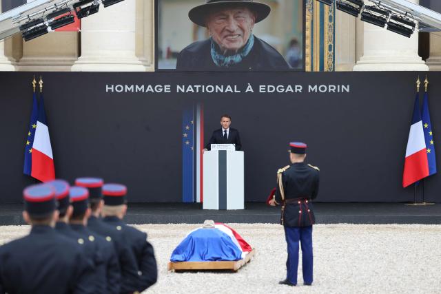 France's President Emmanuel Macron (C) delivers a speech during a national tribute to late French philosopher and sociologist Edgar Morin at the Hotel des Invalides in Paris on June 2, 2026. Edgar Morin has died at the age of 104, on May 29, 2026. (Photo by Ludovic MARIN / AFP)
