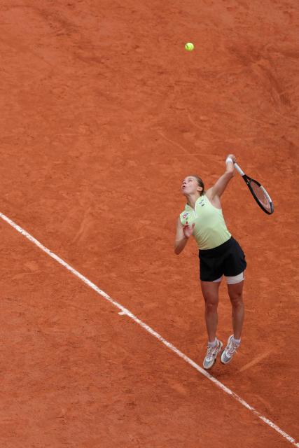 Poland's Maja Chwalinska serves to Anna Kalinskaya during their women's quarter final singles match on day 11 of the French Open tennis tournament on Court Philippe-Chatrier at the Roland-Garros Complex in Paris on June 3, 2026. (Photo by Thomas SAMSON / AFP)
