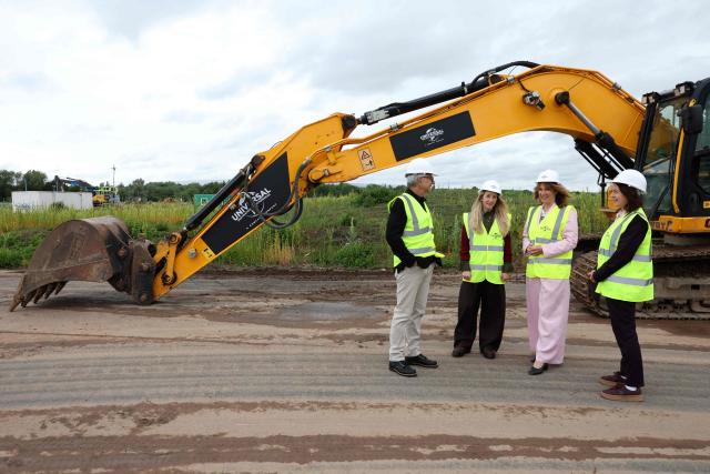Britain's Chancellor of the Exchequer Rachel Reeves (2R) and Chairman and Chief Executive Officer of Universal Destinations & Experiences Mark Woodberry (L) visit the site where the Universal United Kingdom theme park is planned to be built, near Bedford, north of London on June 3, 2026. (Photo by Chris Radburn / POOL / AFP)