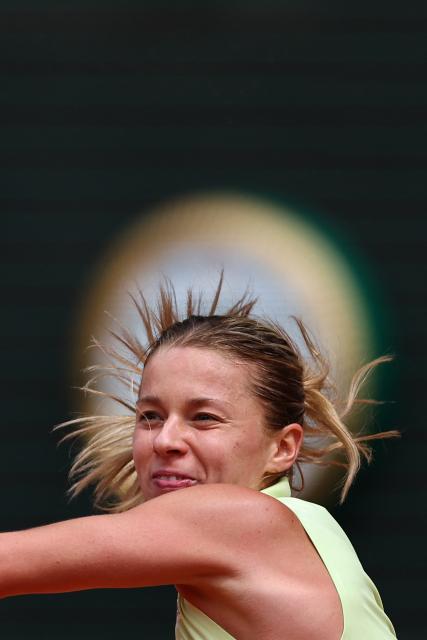 Poland's Maja Chwalinska plays a forehand return to Anna Kalinskaya during their women's quarter final singles match on day 11 of the French Open tennis tournament on Court Philippe-Chatrier at the Roland-Garros Complex in Paris on June 3, 2026. (Photo by Anne-Christine POUJOULAT / AFP)