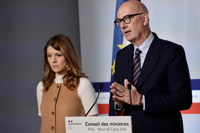France's Government Spokesperson and junior Minister for Energy and Digital economy Maud Bregeon (L) looks on as France's Economy, Finances and Industry Minister Roland Lescure speaks during a press conference following the weekly cabinet meeting at The Elysee Presidential Palace in Paris on June 3, 2026. (Photo by STEPHANE DE SAKUTIN / AFP)