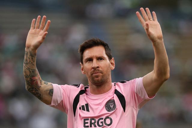(FILES) Inter Miami's Argentine forward #10 Lionel Messi waves to fans during the warm-up ahead of the friendly football match between Colombia's Atletico Nacional and the US' Inter Miami at the Atanasio Girardot Stadium in Medellin, Colombia, on January 31, 2026. The football legend Lionel Messi won the Princess of Asturias Award for Sports June 3, 2026 in Spain, which highlighted the Argentines "humility" on the field and his work off it on behalf of "the most underprivileged children." Messi, "the player who has won the most titles in the history of football, has also earned the respect and admiration of everyone for his exemplary behavior on the field and for his perseverance, humility, and commitment to team play," the jury stated in its decision. (Photo by ESTEBAN VEGA LA-ROTTA / AFP)