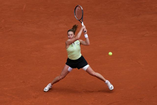 Poland's Maja Chwalinska plays a backhand return to Anna Kalinskaya during their women's quarter final singles match on day 11 of the French Open tennis tournament on Court Philippe-Chatrier at the Roland-Garros Complex in Paris on June 3, 2026. (Photo by Alain JOCARD / AFP)