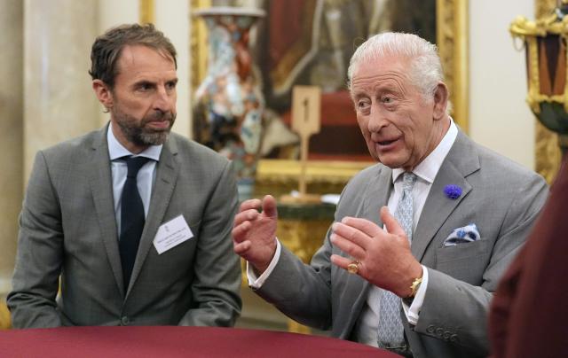 Britain's King Charles III (R) hosts a Youth Opportunity Summit along with former England football manager and King’s Trust Goodwill Ambassador Gareth Southgate (L) at a reception at Buckingham Palace in London, on June 3, 2026. (Photo by Andrew Matthews / POOL / AFP)