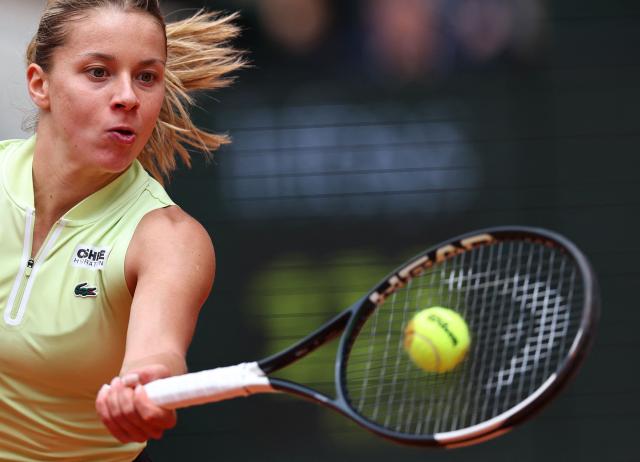 Poland's Maja Chwalinska plays a forehand return to Anna Kalinskaya during their women's quarter final singles match on day 11 of the French Open tennis tournament on Court Philippe-Chatrier at the Roland-Garros Complex in Paris on June 3, 2026. (Photo by Anne-Christine POUJOULAT / AFP)