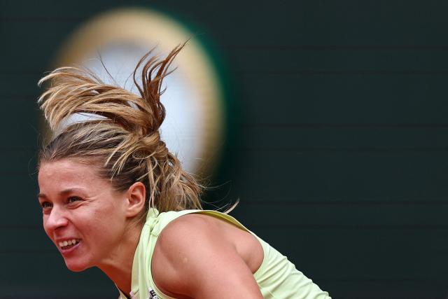 Poland's Maja Chwalinska serves to Anna Kalinskaya during their women's quarter final singles match on day 11 of the French Open tennis tournament on Court Philippe-Chatrier at the Roland-Garros Complex in Paris on June 3, 2026. (Photo by Anne-Christine POUJOULAT / AFP)