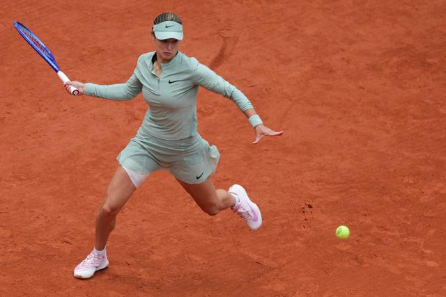 Anna Kalinskaya plays a forehand return to Poland's Maja Chwalinska during their women's quarter final singles match on day 11 of the French Open tennis tournament on Court Philippe-Chatrier at the Roland-Garros Complex in Paris on June 3, 2026. (Photo by Thomas SAMSON / AFP)