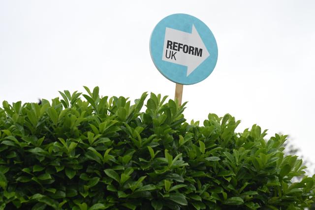 A banner for Reform UK political party is pictured in the garden of a residential property in Ashton-in-Makerfield, west of Manchester in north-west England on June 03, 2026, ahead of the Makerfield by-election. The Makerfield by-election, set to be held on June 18, may see Greater Manchester mayor Andy Burnham return to the government though he would face a tough fight from the poll-topping Reform UK. (Photo by Oli SCARFF / AFP)