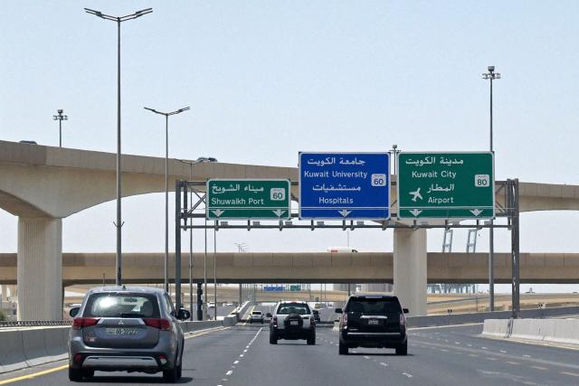 Vehicles drive along the major highway in Kuwait City on June 3, 2026. A Iranian drone strike on a passenger terminal in Kuwait's international airport killed one person and wounded 63 more on June 3, Kuwaiti officials said, as conflict escalated between Tehran and US forces in the Gulf. (Photo by AFP) / 