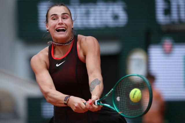 Aryna Sabalenka plays a backhand return to Diana Shnaider during their women's quarter final singles match on day 11 of the French Open tennis tournament on Court Philippe-Chatrier at the Roland-Garros Complex in Paris on June 3, 2026. (Photo by ALAIN JOCARD / AFP)