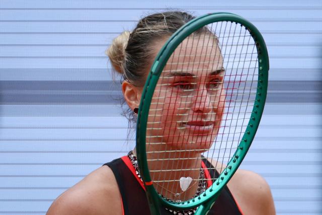 Aryna Sabalenka prepares to return to Diana Shnaider during their women's quarter final singles match on day 11 of the French Open tennis tournament on Court Philippe-Chatrier at the Roland-Garros Complex in Paris on June 3, 2026. (Photo by Alain JOCARD / AFP)