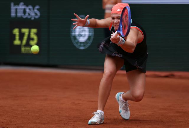Diana Shnaider plays a forehand return to Aryna Sabalenka during their women's quarter final singles match on day 11 of the French Open tennis tournament on Court Philippe-Chatrier at the Roland-Garros Complex in Paris on June 3, 2026. (Photo by ALAIN JOCARD / AFP)