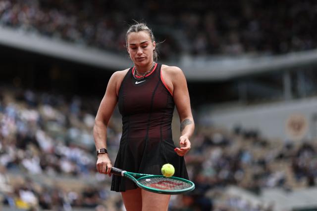 Aryna Sabalenka prepares to serve to Diana Shnaider during their women's quarter final singles match on day 11 of the French Open tennis tournament on Court Philippe-Chatrier at the Roland-Garros Complex in Paris on June 3, 2026. (Photo by Anne-Christine POUJOULAT / AFP)