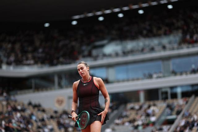 Aryna Sabalenka reacts as she plays against Diana Shnaider during their women's quarter final singles match on day 11 of the French Open tennis tournament on Court Philippe-Chatrier at the Roland-Garros Complex in Paris on June 3, 2026. (Photo by Anne-Christine POUJOULAT / AFP)