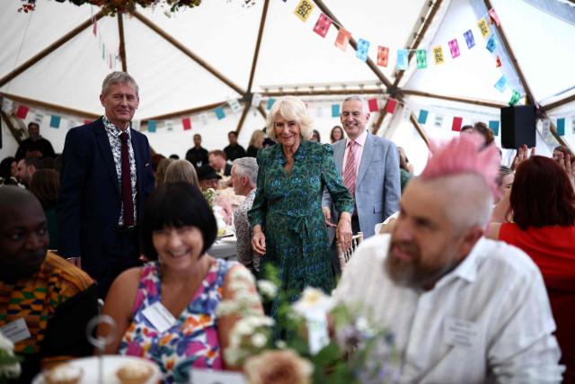 Britain's Queen Camilla smiles during a Big Lunch event at the British Library in central London, on June 3, 2026, to mark the National Year of Reading. The Big Lunch, is the UK’s annual celebration bringing millions of neighbours and communities together in a nationwide act of friendship on the first weekend in June every year since 2009. The Queen has been Patron of The Big Lunch since 2013. (Photo by Henry NICHOLLS / POOL / AFP) / “The erroneous mention[s] appearing in the metadata of this photo by Henry NICHOLLS has been modified in AFP systems in the following manner: [JUNE 3] instead of [JUNE 2]. Please immediately remove the erroneous mention[s] from all your online services and delete it (them) from your servers. If you have been authorized by AFP to distribute it (them) to third parties, please ensure that the same actions are carried out by them. Failure to promptly comply with these instructions will entail liability on your part for any continued or post notification usage. Therefore we thank you very much for all your attention and prompt action. We are sorry for the inconvenience this notification may cause and remain at your disposal for any further information you may require.”