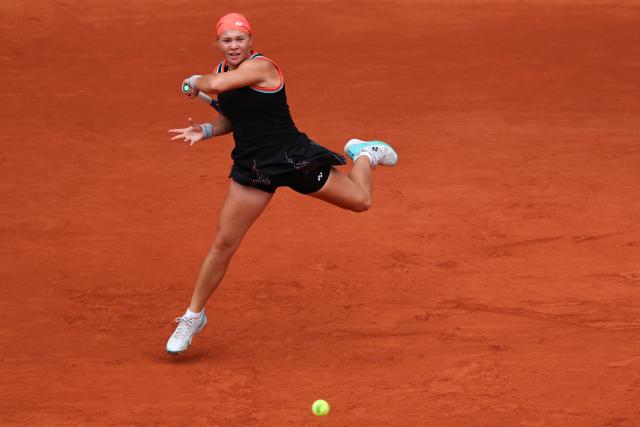 Diana Shnaider plays a forehand return to Aryna Sabalenka during their women's quarter final singles match on day 11 of the French Open tennis tournament on Court Philippe-Chatrier at the Roland-Garros Complex in Paris on June 3, 2026. (Photo by Anne-Christine POUJOULAT / AFP)