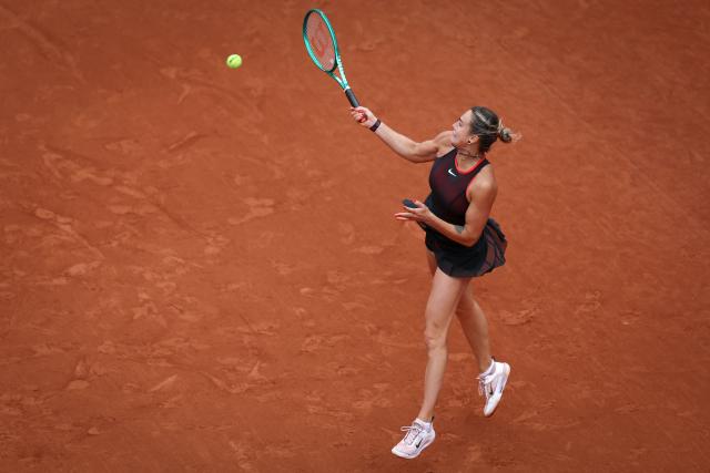 Aryna Sabalenka plays a forehand return to Diana Shnaider during their women's quarter final singles match on day 11 of the French Open tennis tournament on Court Philippe-Chatrier at the Roland-Garros Complex in Paris on June 3, 2026. (Photo by Alain JOCARD / AFP)