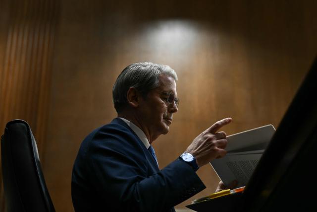 US Secretary of Treasury Scott Bessent looks at his notes as he testifies during a Senate Finance Committee hearing concerning the fiscal year 2027 budget for the Treasury Department, on Capitol Hill in Washington, DC, on June 3, 2026. (Photo by Brendan SMIALOWSKI / AFP)