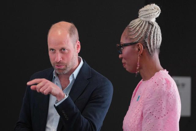 Britain's Prince William, Prince of Wales speaks with CEO of The Diana Award Tessy Ojo at The Diana Award charity during the SXSW (South by Southwest) Festival, in Shoreditch, east London on June 3, 2026. (Photo by Kin CHEUNG / POOL / AFP)