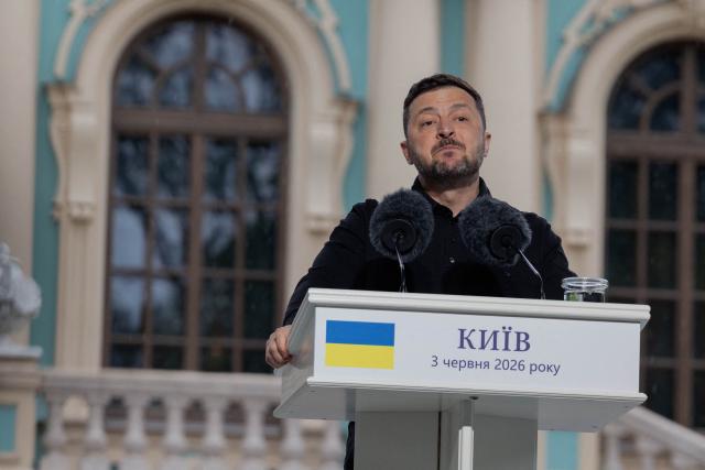 Ukraine's President Volodymyr Zelensky addresses media representatives alongside the NATO Secretary General as they attend a press conference in Kyiv on June 3, 2026, amid the Russian invasion of Ukraine. (Photo by Tetiana DZHAFAROVA / AFP)