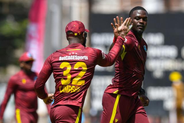 Jayden Seales (R) of West Indies celebrates the dismissal of Kamindu Mendis of Sri Lanka during the 1st One Day International (ODI) cricket match between West Indies and Sri Lanka at Sabina Park in Kingston, Jamaica, on June 3, 2026. (Photo by Randy Brooks / AFP)