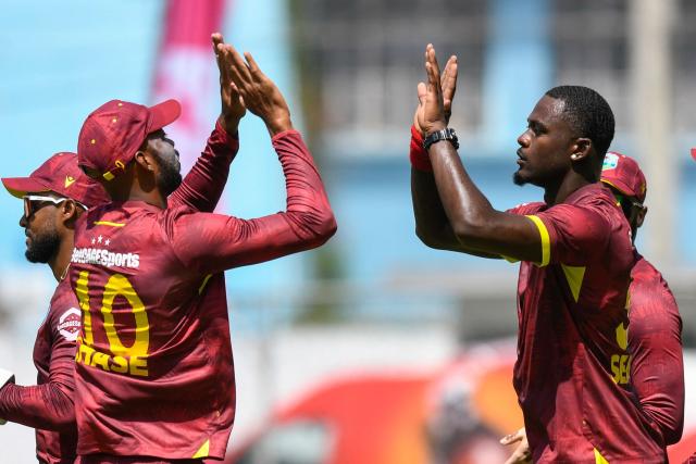Jayden Seales (R) of West Indies celebrates the dismissal of Kamindu Mendis of Sri Lanka during the 1st One Day International (ODI) cricket match between West Indies and Sri Lanka at Sabina Park in Kingston, Jamaica, on June 3, 2026. (Photo by Randy Brooks / AFP)