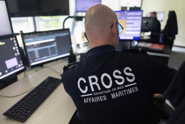 A shift supervisor works at the Cross-A (Regional operational monitoring and rescue center- A for Atlantic) in Etel, western France on June 3, 2026. In France, the CROSS units are responsible for search and rescue operations at sea. (Photo by Fred TANNEAU / AFP)