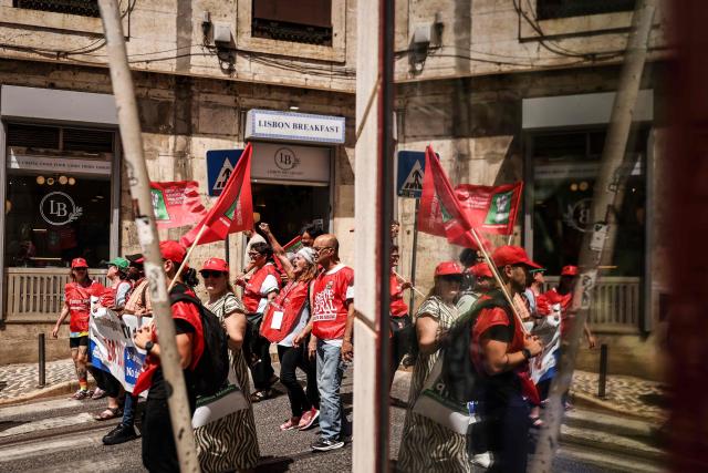 People take part in a demonstration in Lisbon on July 3, 2026, called by the main unions due to a 24-hour general strike over proposed labour reforms. The stoppage hit transport companies as well as waste collection, hospitals and schools, according to the General Confederation of Portuguese Workers (CGTP). (Photo by PATRICIA DE MELO MOREIRA / AFP)