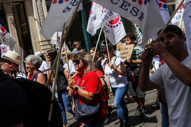 People take part in a demonstration in Lisbon on July 3, 2026, called by the main unions due to a 24-hour general strike over proposed labour reforms. The stoppage hit transport companies as well as waste collection, hospitals and schools, according to the General Confederation of Portuguese Workers (CGTP). (Photo by PATRICIA DE MELO MOREIRA / AFP)