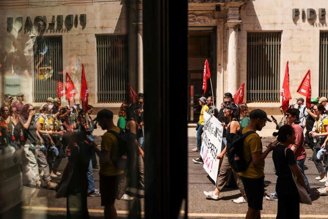 People take part in a demonstration in Lisbon on July 3, 2026, called by the main unions due to a 24-hour general strike over proposed labour reforms. The stoppage hit transport companies as well as waste collection, hospitals and schools, according to the General Confederation of Portuguese Workers (CGTP). (Photo by PATRICIA DE MELO MOREIRA / AFP)