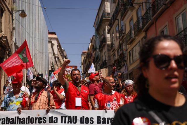 People take part in a demonstration in Lisbon on July 3, 2026, called by the main unions due to a 24-hour general strike over proposed labour reforms. The stoppage hit transport companies as well as waste collection, hospitals and schools, according to the General Confederation of Portuguese Workers (CGTP). (Photo by PATRICIA DE MELO MOREIRA / AFP)