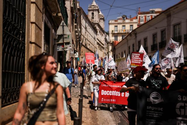 People take part in a demonstration in Lisbon on July 3, 2026, called by the main unions due to a 24-hour general strike over proposed labour reforms. The stoppage hit transport companies as well as waste collection, hospitals and schools, according to the General Confederation of Portuguese Workers (CGTP). (Photo by PATRICIA DE MELO MOREIRA / AFP)