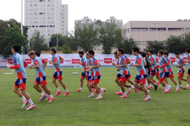 Japan's players take part in a training session at the Tigres Training Centre (CET) in San Nicolas de los Garza, near Monterrey, Mexico on June 3, 2026, ahead of the FIFA 2026 World Cup football tournament. (Photo by Julio Cesar AGUILAR / AFP)