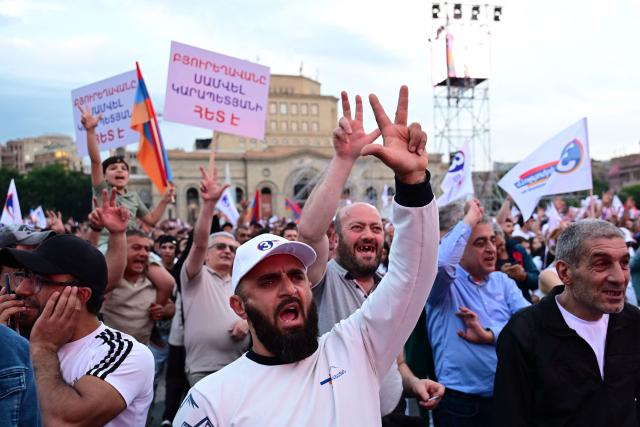 Supporters of Strong Armenia, the party of billionaire Russian-Armenian businessman Samvel Karapetyan - who is under house arrest on charges of plotting a coup, stage a campaign rally in central Yerevan on June 3, 2026, days ahead of the parliamentary elections. (Photo by Karen MINASYAN / AFP)