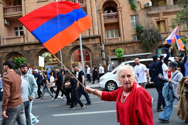 Supporters of Strong Armenia, the party of billionaire Russian-Armenian businessman Samvel Karapetyan - who is under house arrest on charges of plotting a coup, stage a campaign march in Yerevan on June 3, 2026, days ahead of the parliamentary elections. (Photo by Karen MINASYAN / AFP)