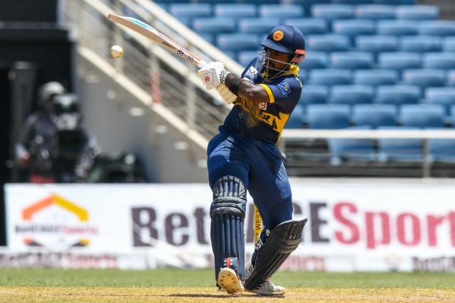 Charith Asalanka of Sri Lanka hits 4 during the 1st One Day International (ODI) cricket match between West Indies and Sri Lanka at Sabina Park in Kingston, Jamaica, on June 3, 2026. (Photo by Randy Brooks / AFP)