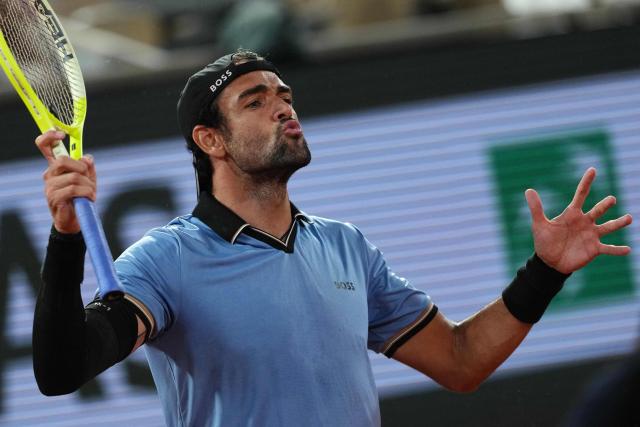 Italy's Matteo Berrettini reacts to a point against Italy's Matteo Arnaldi during their men's quarter final singles match on day 11 of the French Open tennis tournament on Court Philippe-Chatrier at the Roland-Garros Complex in Paris on June 3, 2026. (Photo by Dimitar DILKOFF / AFP)
