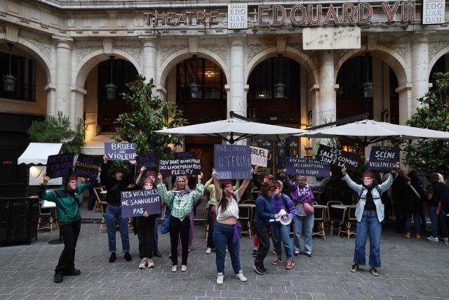 Members of the French feminist collective "NousToutes" (Us all) protest outside the Edouard VII theatre to express their anger at the impunity of alleged abusers and call for singer and actor Patrick Bruel to be withdrawn from all stage performances and demanding the complete cancellation of his tour, in Paris, on June 3, 2026. A performance of the play "Deuxieme Partie" was briefly disrupted on the evening of May 27, 2026 in Paris by activists from the feminist collective Nous Toutes who had taken their seats in the Theatre Edouard VII, according to videos posted on social media. Patrick Bruel is currently facing four rape allegations in France and a judicial investigation into sexual assault in Belgium. He denies all the allegations against him. (Photo by Xavier GALIANA / AFP)