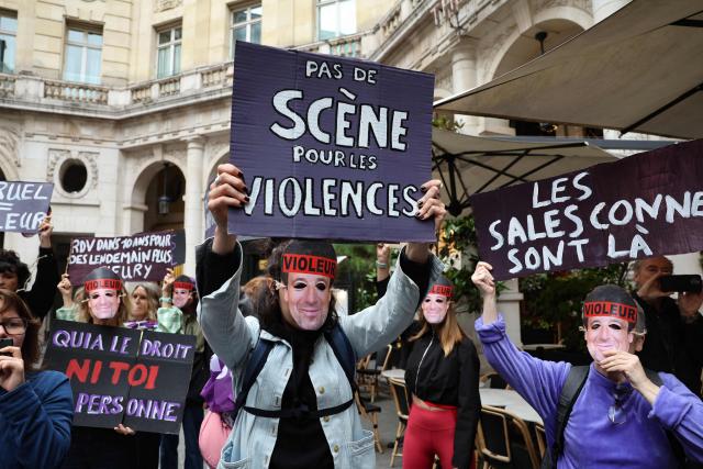 Members of the French feminist collective "NousToutes" (Us all) protest which read "no stage for violence" outside the Edouard VII theatre to express their anger at the impunity of alleged abusers and call for singer and actor Patrick Bruel to be withdrawn from all stage performances and demanding the complete cancellation of his tour, in Paris, on June 3, 2026. A performance of the play "Deuxieme Partie" was briefly disrupted on the evening of May 27, 2026 in Paris by activists from the feminist collective Nous Toutes who had taken their seats in the Theatre Edouard VII, according to videos posted on social media. Patrick Bruel is currently facing four rape allegations in France and a judicial investigation into sexual assault in Belgium. He denies all the allegations against him. (Photo by Xavier GALIANA / AFP)