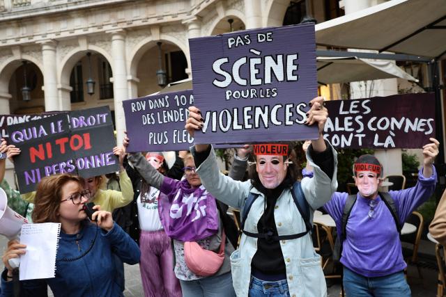 Members of the French feminist collective "NousToutes" (Us all) protest which read "no stage for violence" outside the Edouard VII theatre to express their anger at the impunity of alleged abusers and call for singer and actor Patrick Bruel to be withdrawn from all stage performances and demanding the complete cancellation of his tour, in Paris, on June 3, 2026. A performance of the play "Deuxieme Partie" was briefly disrupted on the evening of May 27, 2026 in Paris by activists from the feminist collective Nous Toutes who had taken their seats in the Theatre Edouard VII, according to videos posted on social media. Patrick Bruel is currently facing four rape allegations in France and a judicial investigation into sexual assault in Belgium. He denies all the allegations against him. (Photo by Xavier GALIANA / AFP)