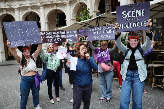Members of the French feminist collective "NousToutes" (Us all) protest with placards outside the Edouard VII theatre to express their anger at the impunity of alleged abusers and call for singer and actor Patrick Bruel to be withdrawn from all stage performances and demanding the complete cancellation of his tour, in Paris, on June 3, 2026. A performance of the play "Deuxieme Partie" was briefly disrupted on the evening of May 27, 2026 in Paris by activists from the feminist collective Nous Toutes who had taken their seats in the Theatre Edouard VII, according to videos posted on social media. Patrick Bruel is currently facing four rape allegations in France and a judicial investigation into sexual assault in Belgium. He denies all the allegations against him. (Photo by Xavier GALIANA / AFP)