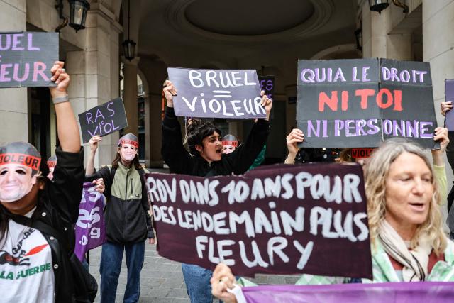 Members of the French feminist collective "NousToutes" (Us all) protest with placards outside the Edouard VII theatre to express their anger at the impunity of alleged abusers and call for singer and actor Patrick Bruel to be withdrawn from all stage performances and demanding the complete cancellation of his tour, in Paris, on June 3, 2026. A performance of the play "Deuxieme Partie" was briefly disrupted on the evening of May 27, 2026 in Paris by activists from the feminist collective Nous Toutes who had taken their seats in the Theatre Edouard VII, according to videos posted on social media. Patrick Bruel is currently facing four rape allegations in France and a judicial investigation into sexual assault in Belgium. He denies all the allegations against him. (Photo by Xavier GALIANA / AFP)